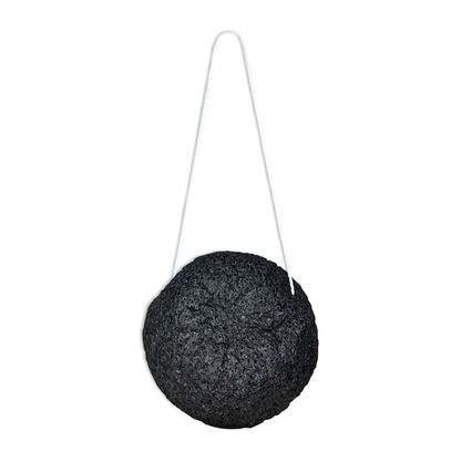 Natural Konjac Sponge for exfoliating face scrub with string for hanging. Biodegradable, all-natural konjac root fiber.