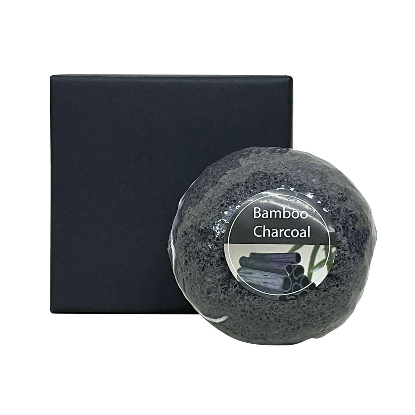 Bamboo Charcoal Konjac Sponge with black packaging for natural face exfoliation and impurity removal.