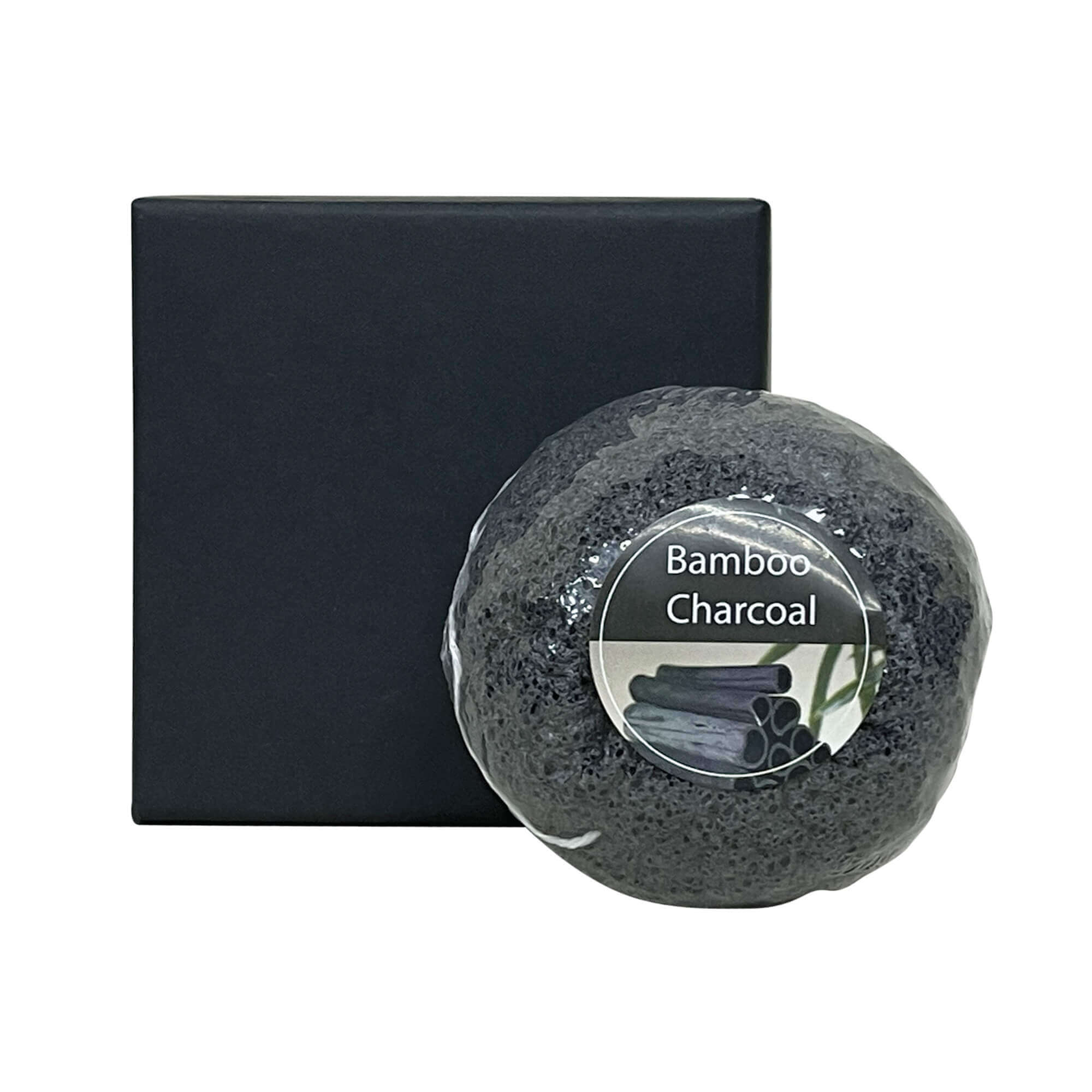 Bamboo Charcoal Konjac Sponge with black packaging for natural face exfoliation and impurity removal.